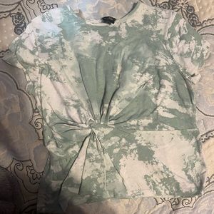 green and white tiedie with tie in middle